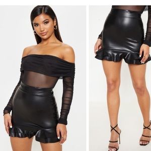 black faux leather frilled hem mini skirt